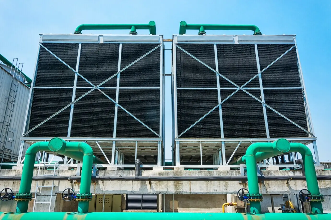 Groups of cooling towers in a data center building.